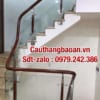 Cầu thang lan can kính cường lực tay vịn gỗ đẹp nhất tại Hà Nội