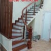 Cầu thang kính lan can kính đẹp tay vịn gỗ tại Hà Nội
