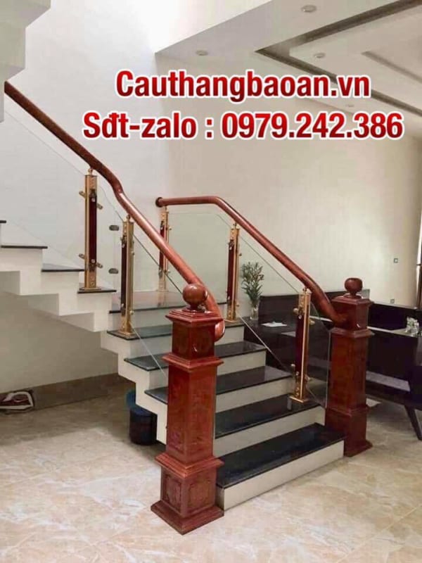 Cầu thang lan can kính tay vịn gỗ, báo giá cầu thang lan can kính cường lực tại Hà Nội. Các mẫu cầu thang lan can kính đẹp hiện đại
