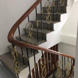 Cầu thang sắt lan can sắt tay gỗ