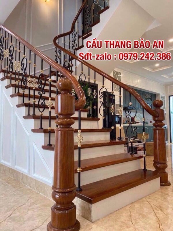 Cầu thang sắt tay vịn gỗ đẹp , Cầu thang sắt mỹ thuật tại Hà Nội