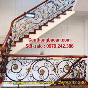 Mẫu cầu thang sắt mỹ thuật tại Hà Nội, Cầu thang sắt nghệ thuật đẹp tay vịn gỗ