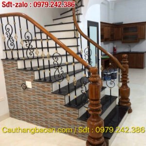 Cầu thang sắt đẹp tay vịn gỗ , Mẫu cầu thang sắt mỹ thuật tại Hà Nội