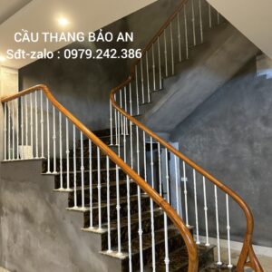 CẦU THANG SẮT NGHỆ THUẬT ĐẸP . MẪU CẦU THANG SẮT TAY VỊN GỖ