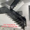 CẦU THANG KÍNH XÁM KHÓI . CẦU THANG KÍNH ĐẸP TAY VỊN GỖ